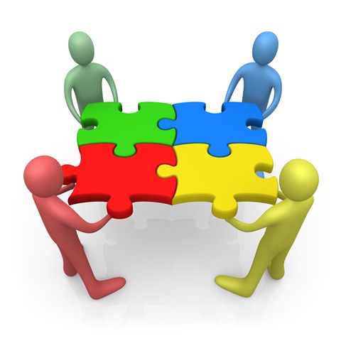 Four colorful 3D figures assembling a four-piece puzzle on a white background, symbolizing teamwork and collaboration.