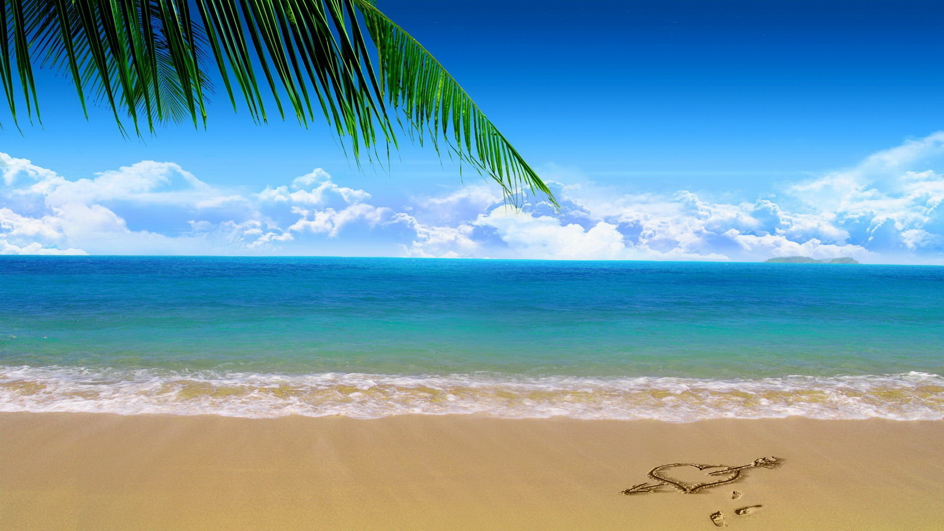 Tropical beach with turquoise water, golden sand, palm frond overhead, and a heart-and-arrow drawing in the sand.