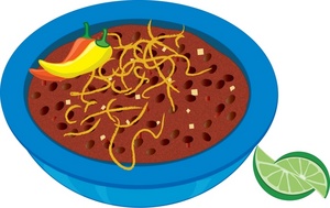 A vibrant blue bowl filled with red chili, topped with shredded cheese, a yellow chili pepper, and a lime wedge on the side.