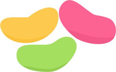 Three colorful jelly beans-yellow, pink, and green-arranged on a white background.