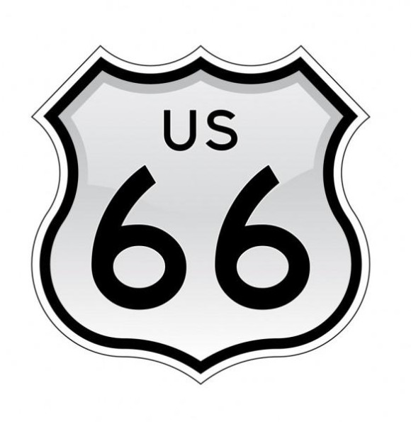 Classic US Route 66 shield sign with bold black numerals on a white background, iconic American highway symbol.