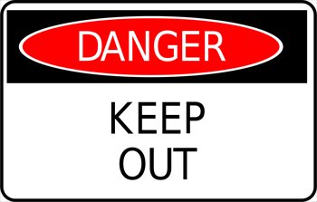 Red oval "DANGER" warning sign with black "KEEP OUT" text on white background.