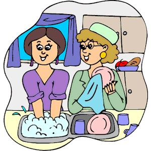 Two women smiling while washing dishes together in a cozy kitchen setting.