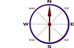 A purple-rimmed compass rose with a red needle pointing north on a white background.