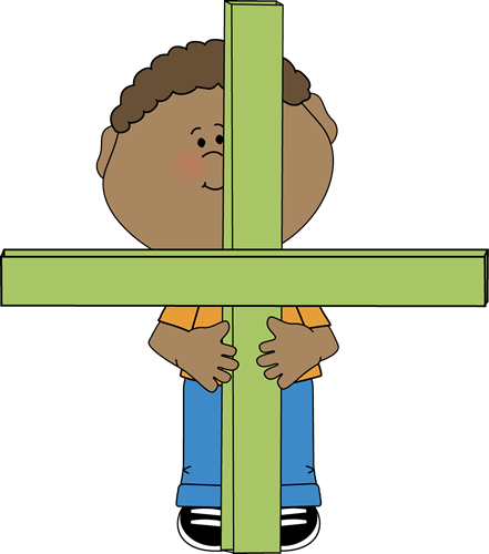 A smiling child with curly hair holds a green cross, symbolizing faith and innocence.