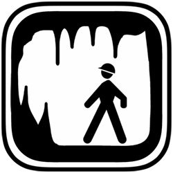 Silhouette of a person wearing a helmet walking into a cave entrance, depicted as a black-and-white icon.