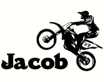 Silhouette of a motocross rider performing a wheelie on a dirt bike with the name "Jacob" below.