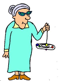 Elderly woman in teal dress and sunglasses holding a colorful atom model.
