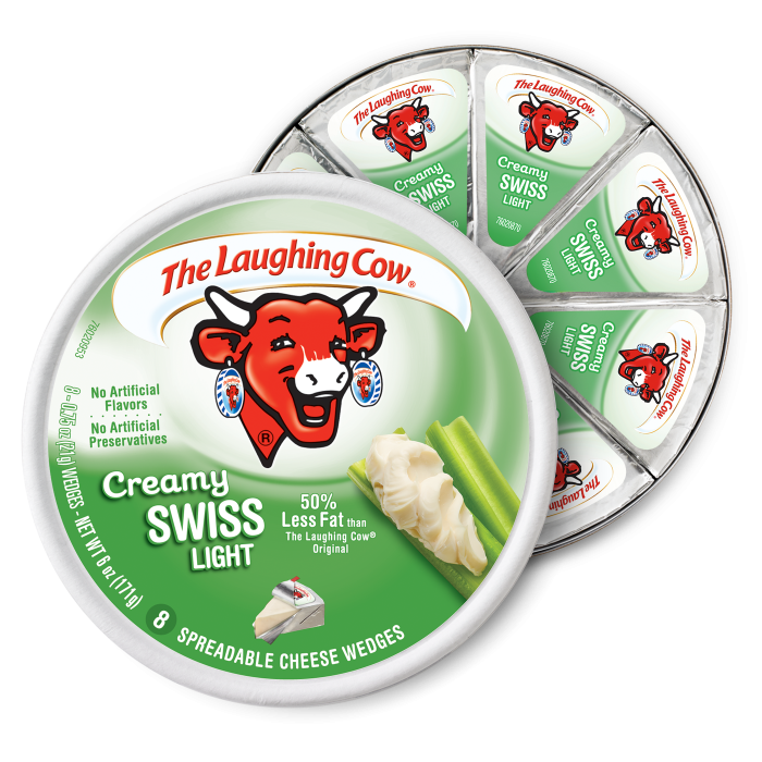 The Laughing Cow Creamy Swiss Light cheese wedges in a round container with green labeling and red cow logo.