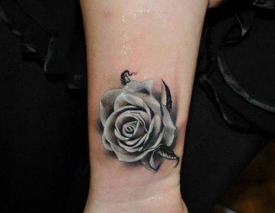 Rose tattoo on Margarets right upper arm By Phil  Official Tumblr  page for Tattoofilter for Men and Women