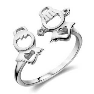 Silver open-style ring featuring a snowman and reindeer charm with heart cutouts and small gem accents.
