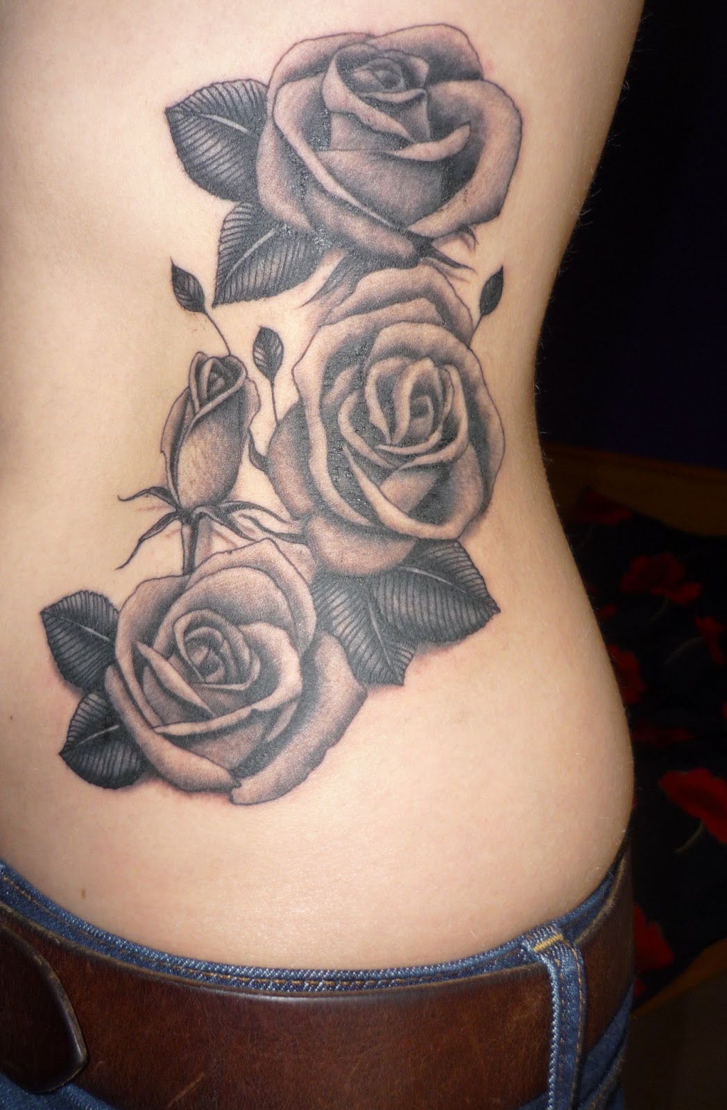 Look at the finished job of my black rose tattoo!!! Is it still black? :  r/TattooDesigns