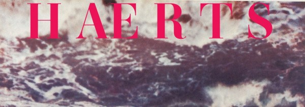 Bold red "HAERTS" text overlaid on a textured, stormy ocean wave background.