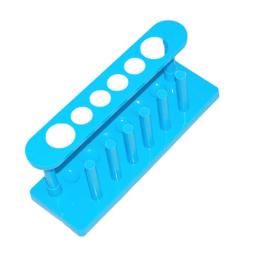Bright blue plastic test tube rack with six vertical holders and a top row of circular cutouts for labeling or storage.