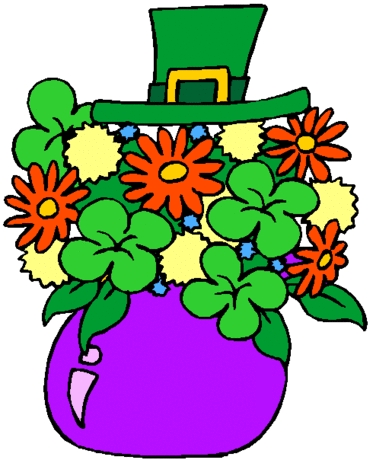 A vibrant St. Patrick’s Day bouquet with shamrocks, orange and yellow flowers, and a green leprechaun hat in a purple vase.