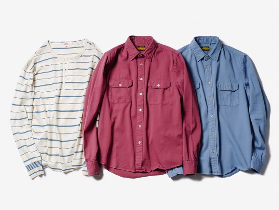 Three men's long-sleeve shirts-striped cream, burgundy, and blue-laid flat on white background.