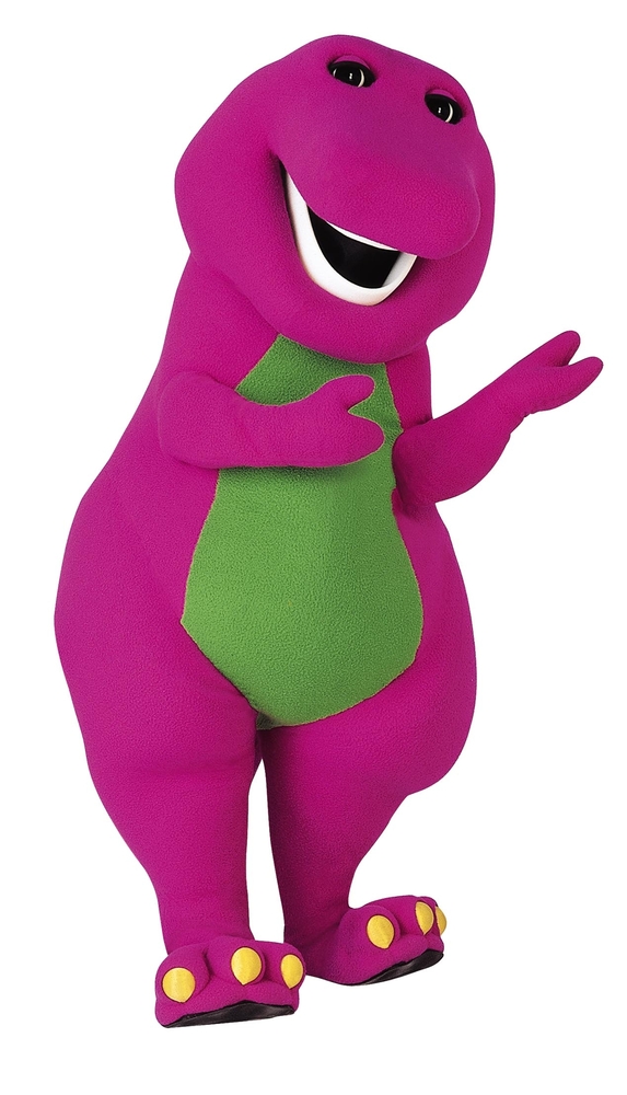 Barney the purple dinosaur waving cheerfully with a green belly patch and yellow toes.