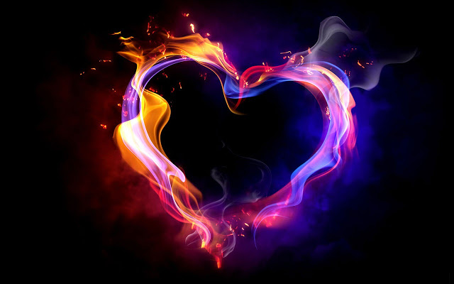 A vibrant heart-shaped flame with swirling orange, pink, purple, and blue hues against a dark background.