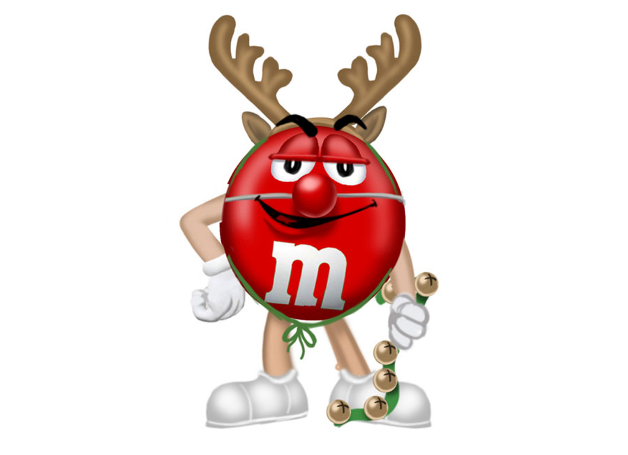 Red M&M character dressed as a reindeer with antlers, red nose, and jingle bells, smiling confidently.