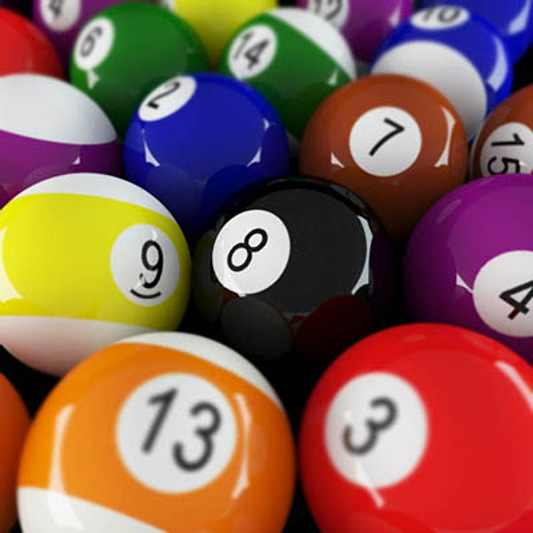 A vibrant close-up of standard numbered pool balls, including the black 8-ball, yellow 9-ball, and orange 13-ball, arranged in a tight cluster.