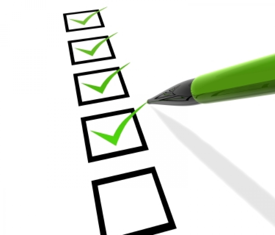 Checklist with Green Checkmarks and Pen - Task Completion Visual
