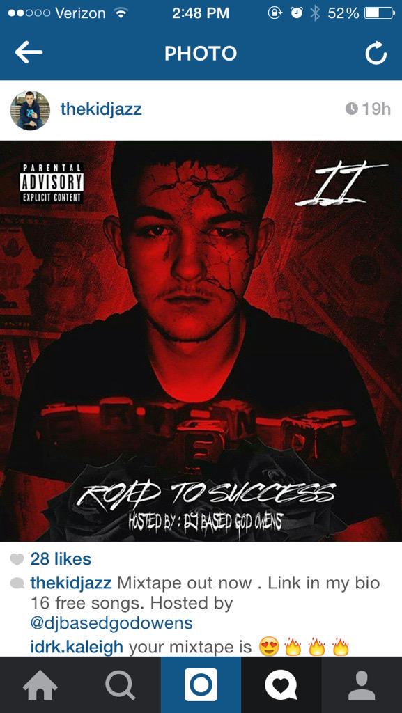 Album cover for "Road to Success" mixtape by The Kid Jazz, featuring red lighting, cracked face effect, and parental advisory label.