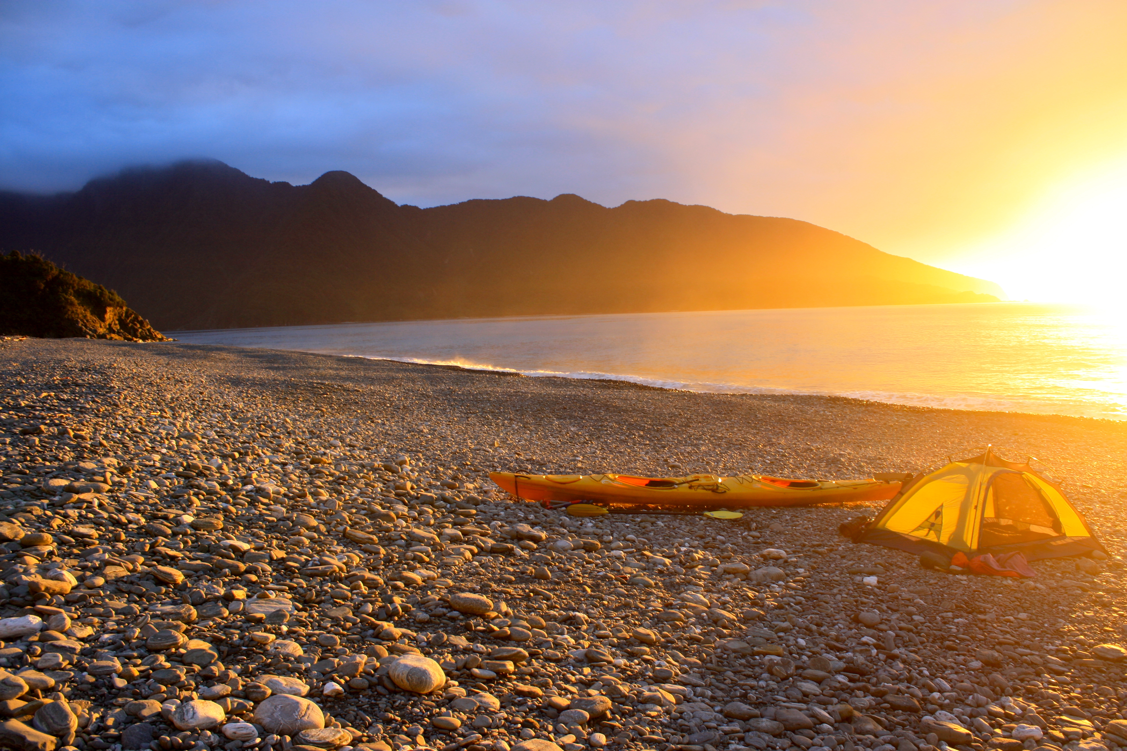 Sunset Camping & Kayaking on a Pebble Beach - Adventure Travel Inspiration