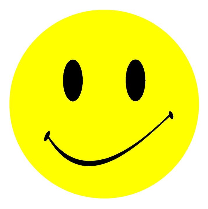 Bright yellow smiley face with black eyes and curved smile, symbolizing happiness and positivity.