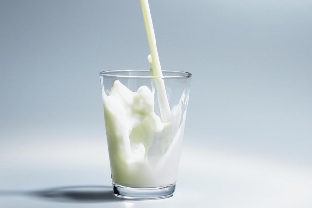 Pouring Milk into Glass - Fresh Dairy Drink Photography