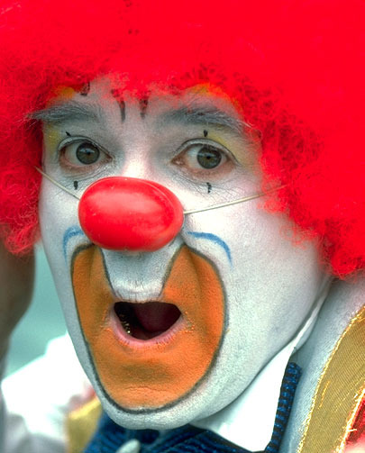 Expressive Clown Face - Vivid Circus Makeup and Emotion