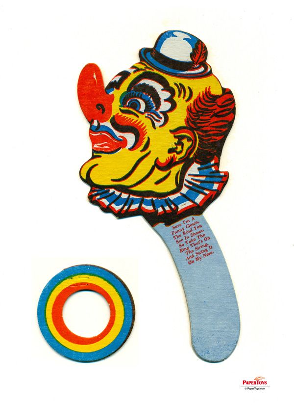 Vintage paper clown hand fan with ring toss game, colorful 1950s design featuring exaggerated facial features and ruffled collar.