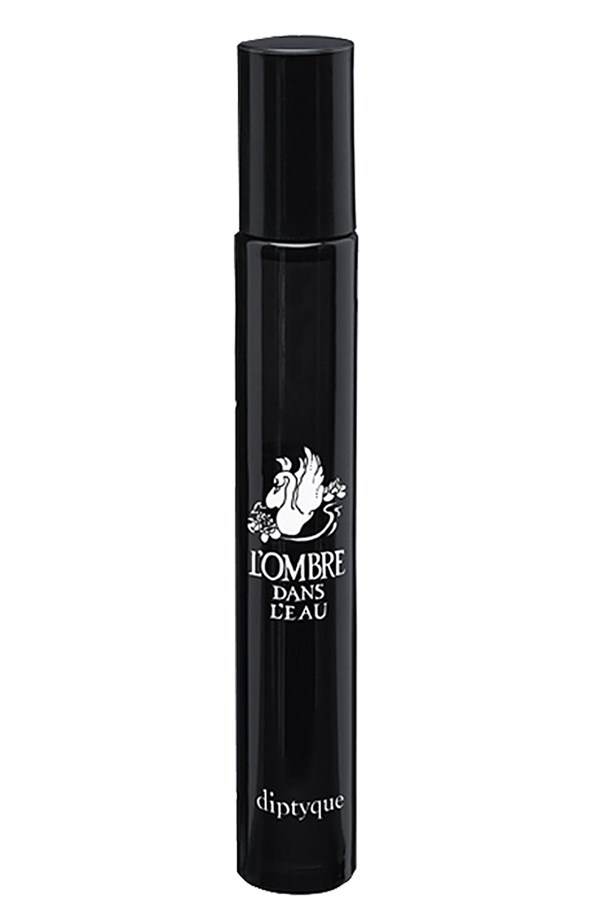 Black diptyque L’Ombre Dans L’Eau rollerball perfume bottle with white swan logo and elegant typography on white background.