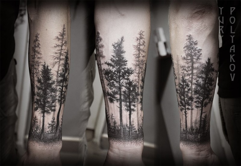 Beautiful black ink trees tattoo on forearm 