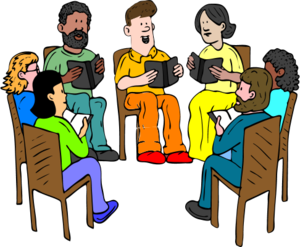 people sitting on chairs and reading books 