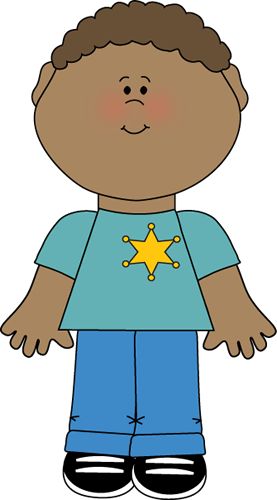 Boy wearing a sheriff&badge. 