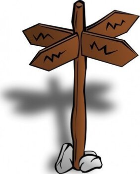 Wooden signpost with four directional arrows pointing in different directions, each marked with a zigzag line, standing on two rocks with a shadow cast behind.